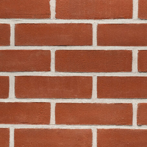 Close up of a wall of Sheringham Red Stock bricks