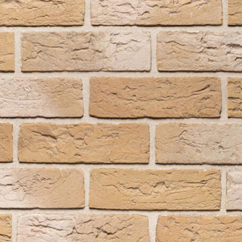 Close up of a wall of Mirato White Handmade bricks