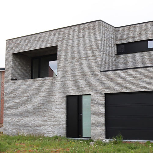 An exterior of a house built using Atlantis Four bricks