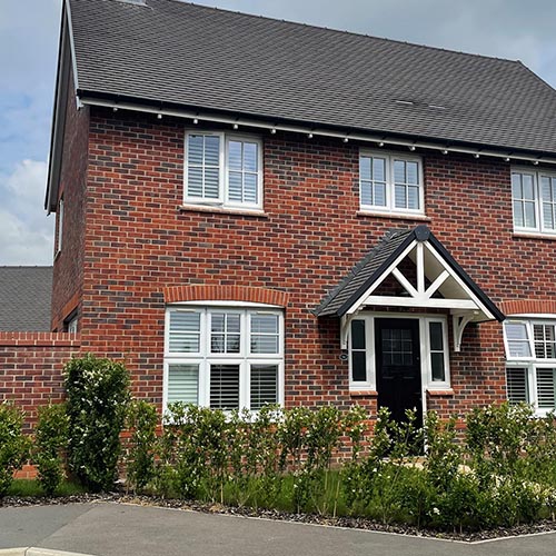 An exterior of a house built using Red Multi Stock bricks