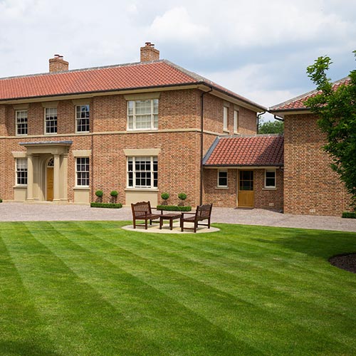An exterior of a house built using Galtres bricks