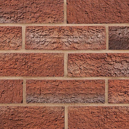 Close up of a wall of Wolds Autumn Blend bricks