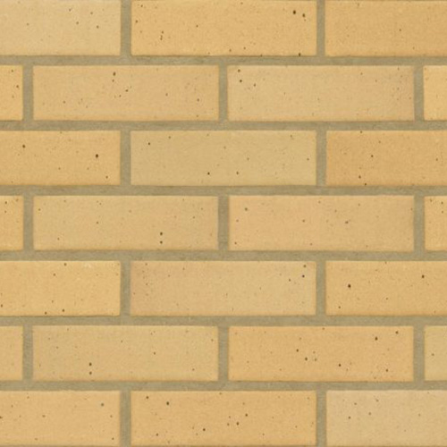 Close up of a wall of Yellow Smooth bricks
