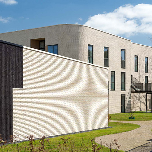 Rear exterior of a house built using Nordic White bricks