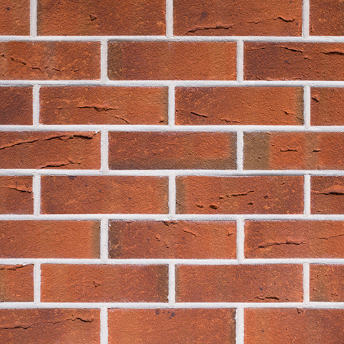 Close up of a wall of Ramecroix bricks