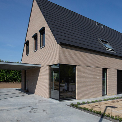 An exterior of a house built using Fort Grey bricks