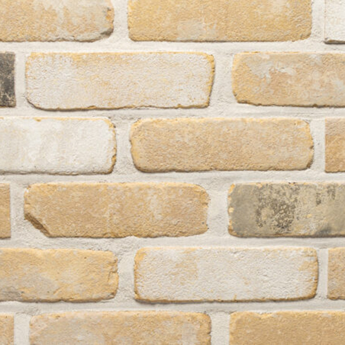 Close up of a wall of Downham Yellow Mixture bricks