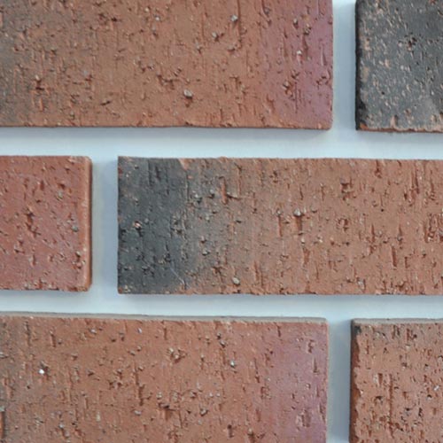 Close up of a wall of Jacobite bricks