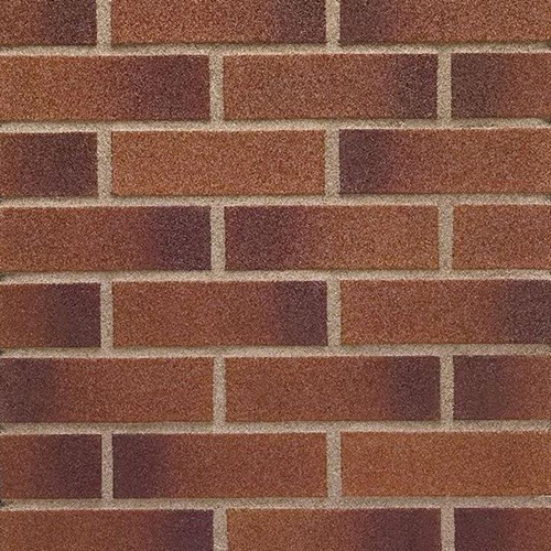 Close up of a wall of Mulberry Red bricks