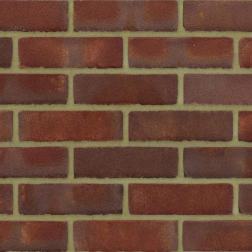 Close up of a wall of Monarch Red Multi Stock bricks