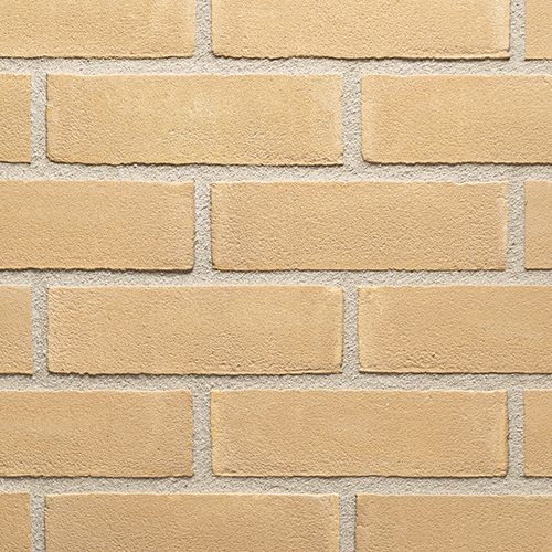 Close up of a wall of Anglian Cream bricks