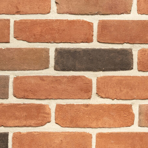 Close up of a wall of Beverley Red Rustica bricks