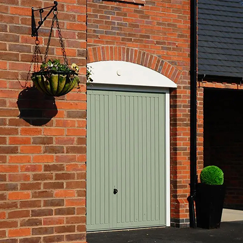 A garage door surrounded by Cumberland Blend bricks