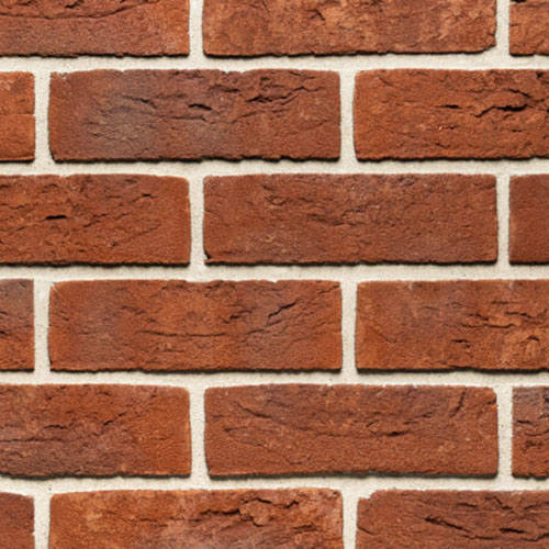 Close up of a wall of Anglian Red Handmade bricks