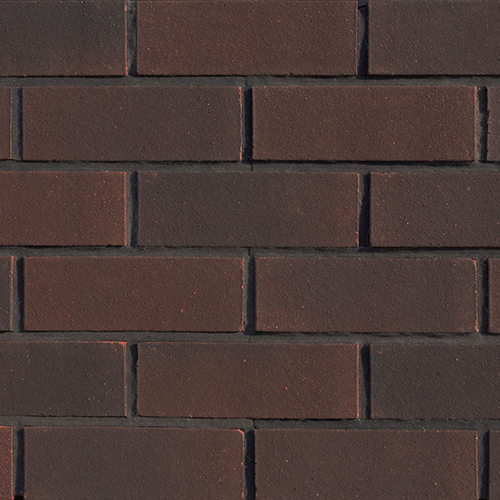 Close up of a wall of Godiva Multi Sandfaced bricks
