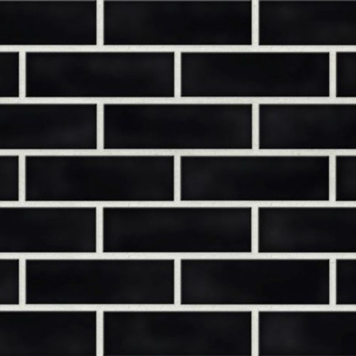 Close up of a wall of Black Glazed bricks