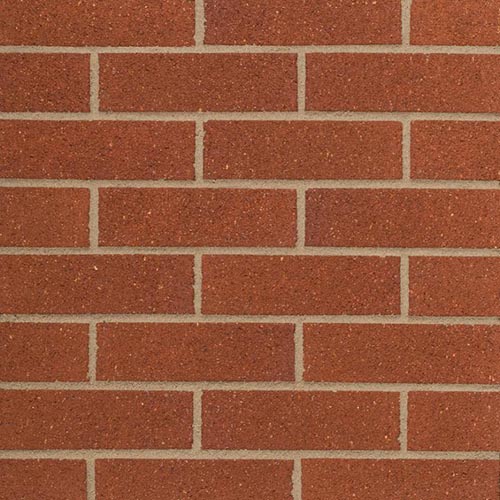 Close up of a wall of Swarland Pink bricks