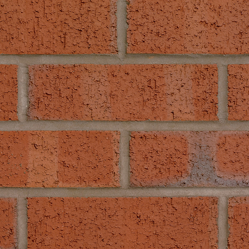 Close up of a wall of Russet Mixture bricks