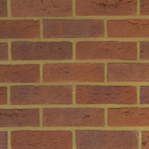 Close up of a wall of Red Blend Handmade bricks