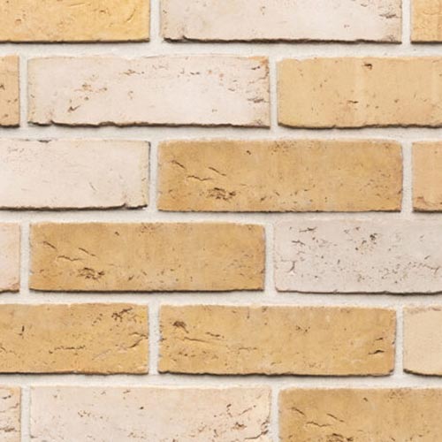 Close up of a wall of Mirato White Waterstruck bricks
