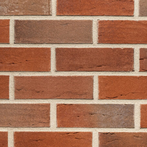 Close up of a wall of Graven Red Multi bricks