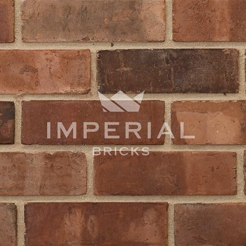 Close up of a wall of Weathered Pre War Common bricks