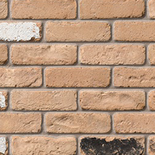 Close up of a wall of Ramian Buff Stock Blend bricks