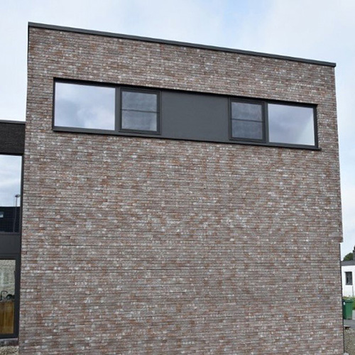 An exterior of a property built using Lava Blue bricks