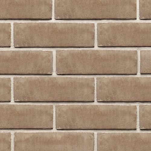 Close up of a wall of Light Grey Stock bricks