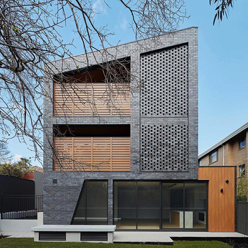An exterior of a house built using Blue Black Multi Smooth bricks