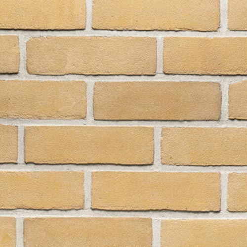 Close up of a wall of Longthorpe Buff Stock bricks