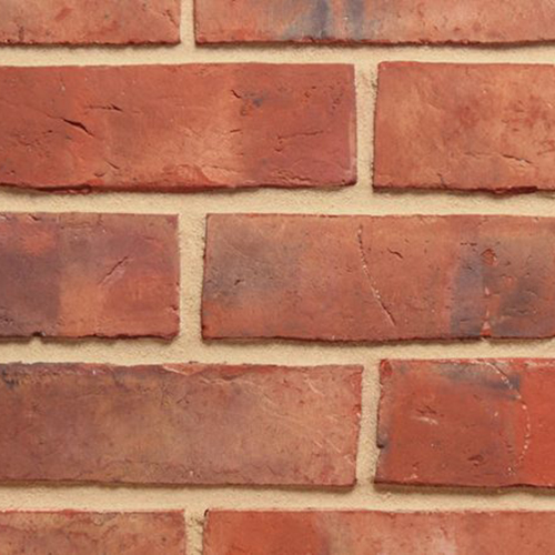 Close up of a wall of Lightly Weathered Waterstruck bricks