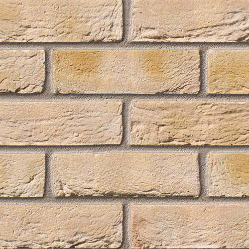 Close up of a wall of Bradgate Multi Cream bricks