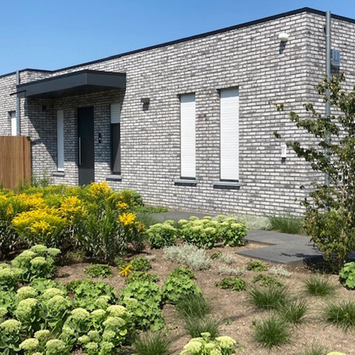 An exterior of a house built using Karma Phoenix bricks