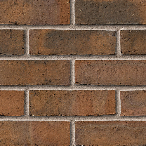 Close up of a wall of Birtley Brown Waterstruck bricks