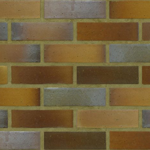 Close up of a wall of Yellow Multi Smooth bricks