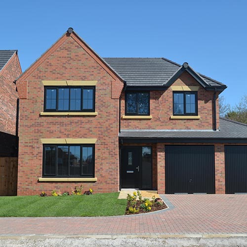 A rear view of an Oldstock Antique brick house