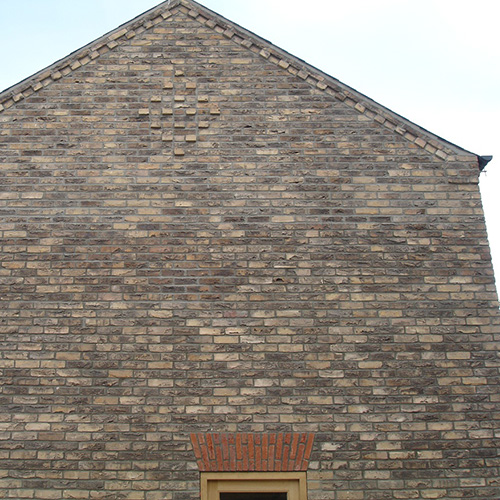 Rear exterior of a house built using Kilburn bricks