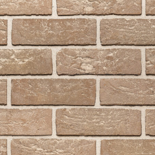 Close up of a wall of Light Grey Handmade bricks