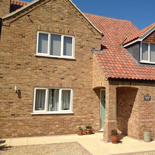 An exterior of a house built using Kenilworth Antique bricks