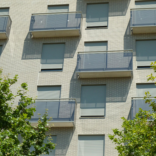 An exterior of a residence built using Light Grey Smooth bricks
