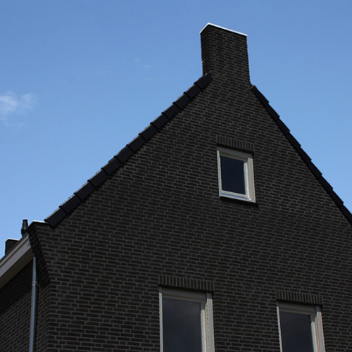 An exterior of a house built using Midnight Stock bricks