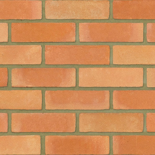 Close up of a wall of Atlas Orange Multi bricks
