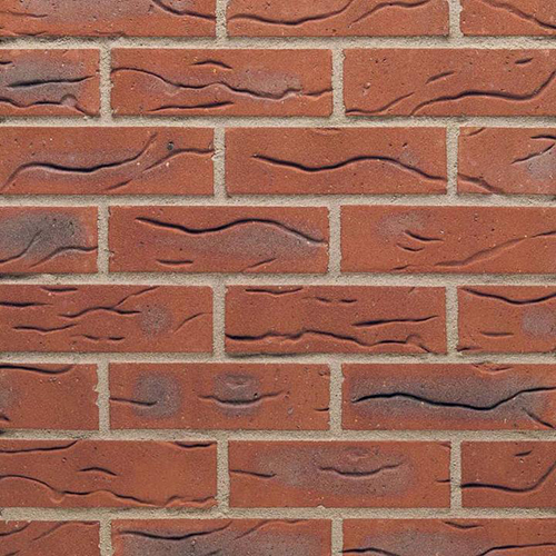 Close up of a wall of Draycott Red Multi bricks