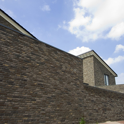 A boundary wall built using Klampaert Classic bricks