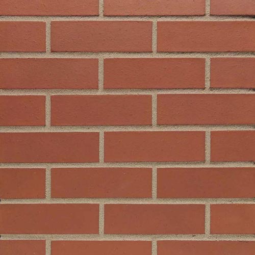 Close up of a wall of Staffordshire Smooth Red bricks