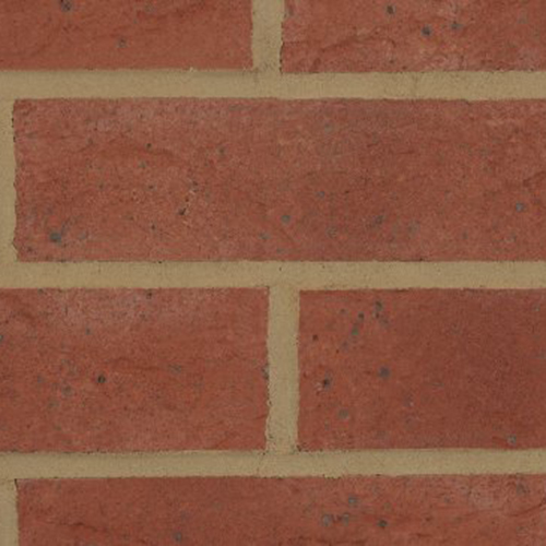 Close up of a wall of Teviot Red bricks