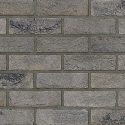 Close up of a wall of Olympus Grey bricks