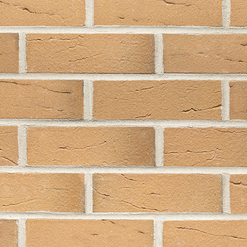 Close up of a wall of Arundel Buff Multi bricks