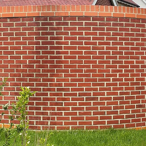 Garden wall built using Sheringham Red Stock bricks